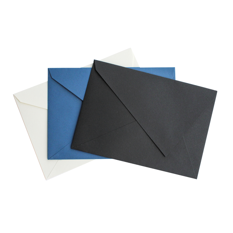 Envelope with triangular side flap